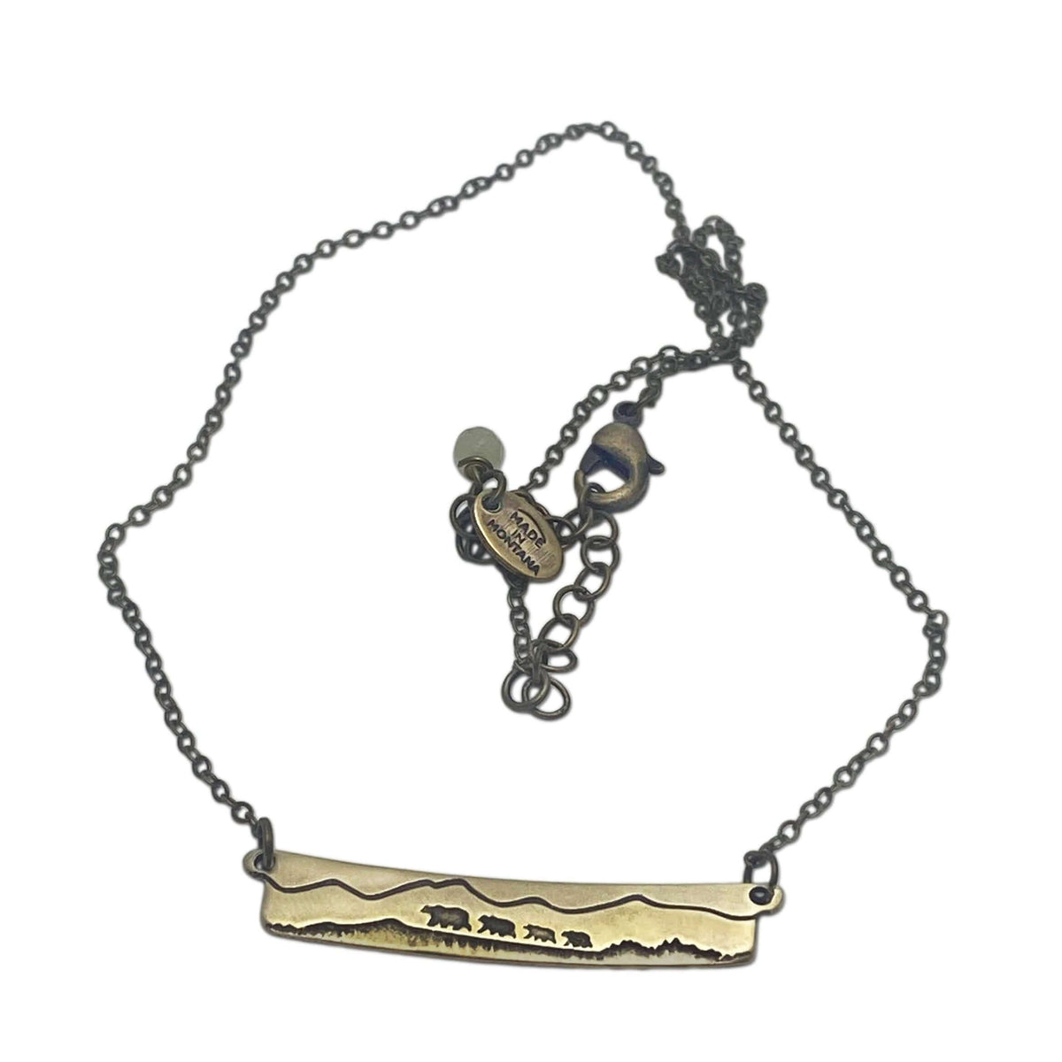 Bear Family Necklace featuring a mama bear and her cubs against a mountain backdrop in antique brass finish.