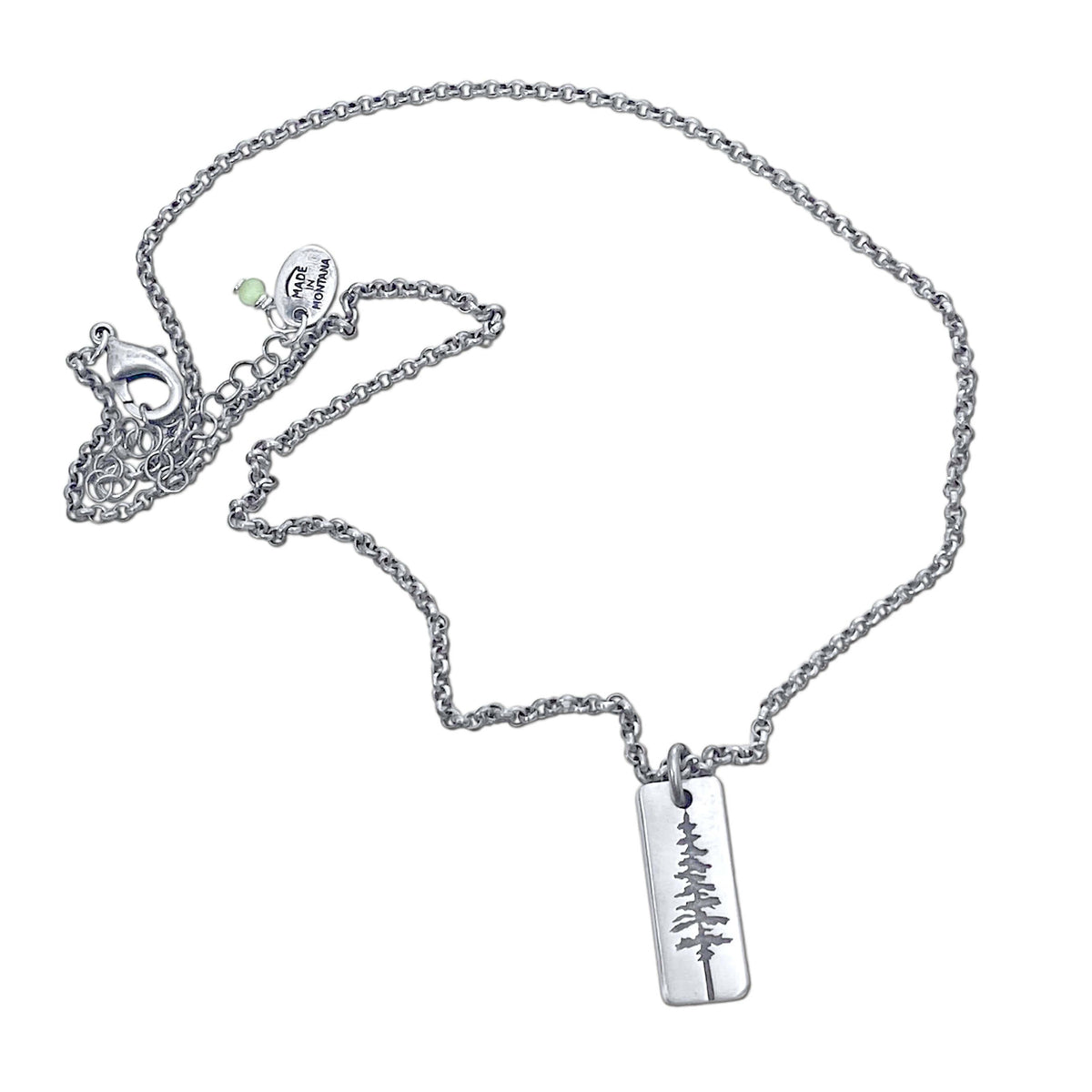 Elegant Pine Tree Necklace on a silver chain, inspired by the Ponderosa Pine, perfect for nature lovers.