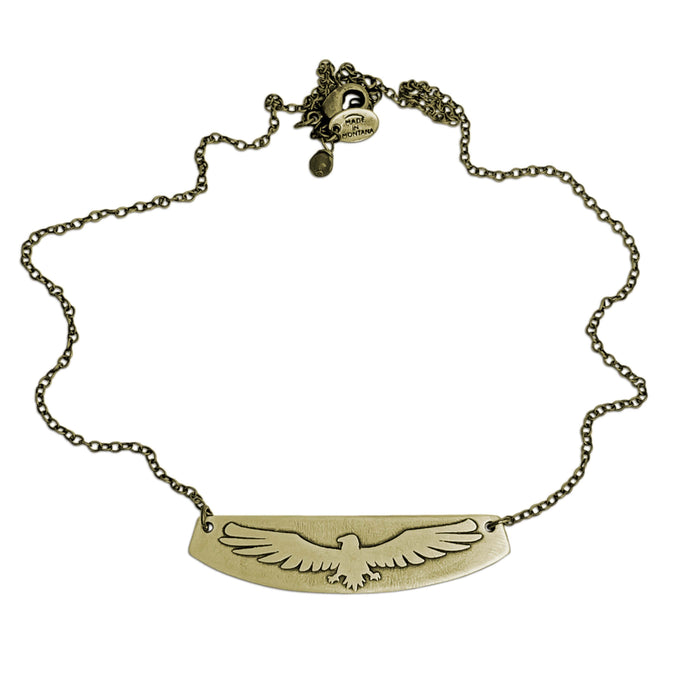 Freebird Necklace showcasing solid brass pendant with eagle design on an adjustable cable chain.