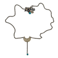 Moonbeam Y Necklace with unique moon-inspired design and turquoise accent, perfect for astrology lovers.