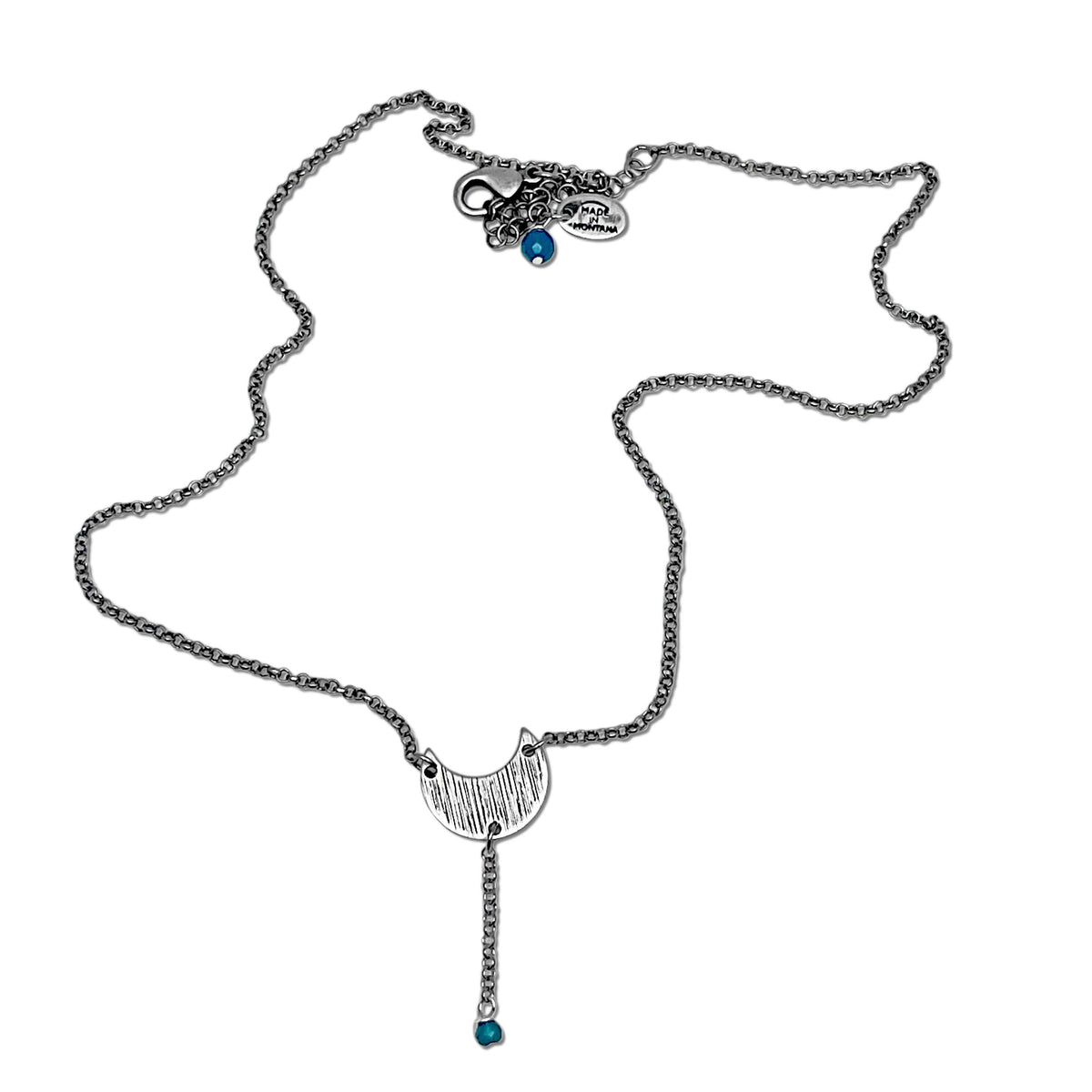 Moonbeam Y Necklace featuring a unique design resembling lunar topography, handcrafted in Montana.