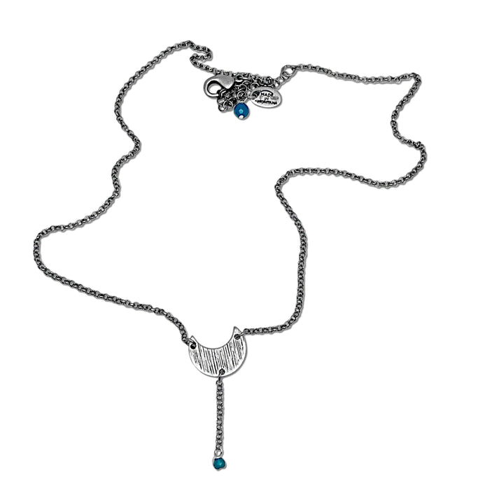 Moonbeam Y Necklace featuring a unique design resembling lunar topography, handcrafted in Montana.