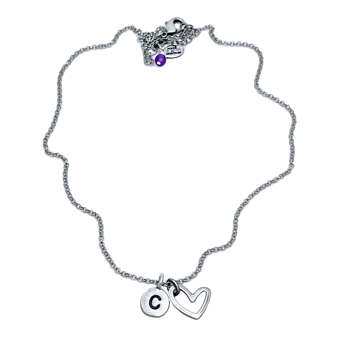 Open Heart Initial Necklace featuring a heart charm and initial 'C' on a delicate silver chain.
