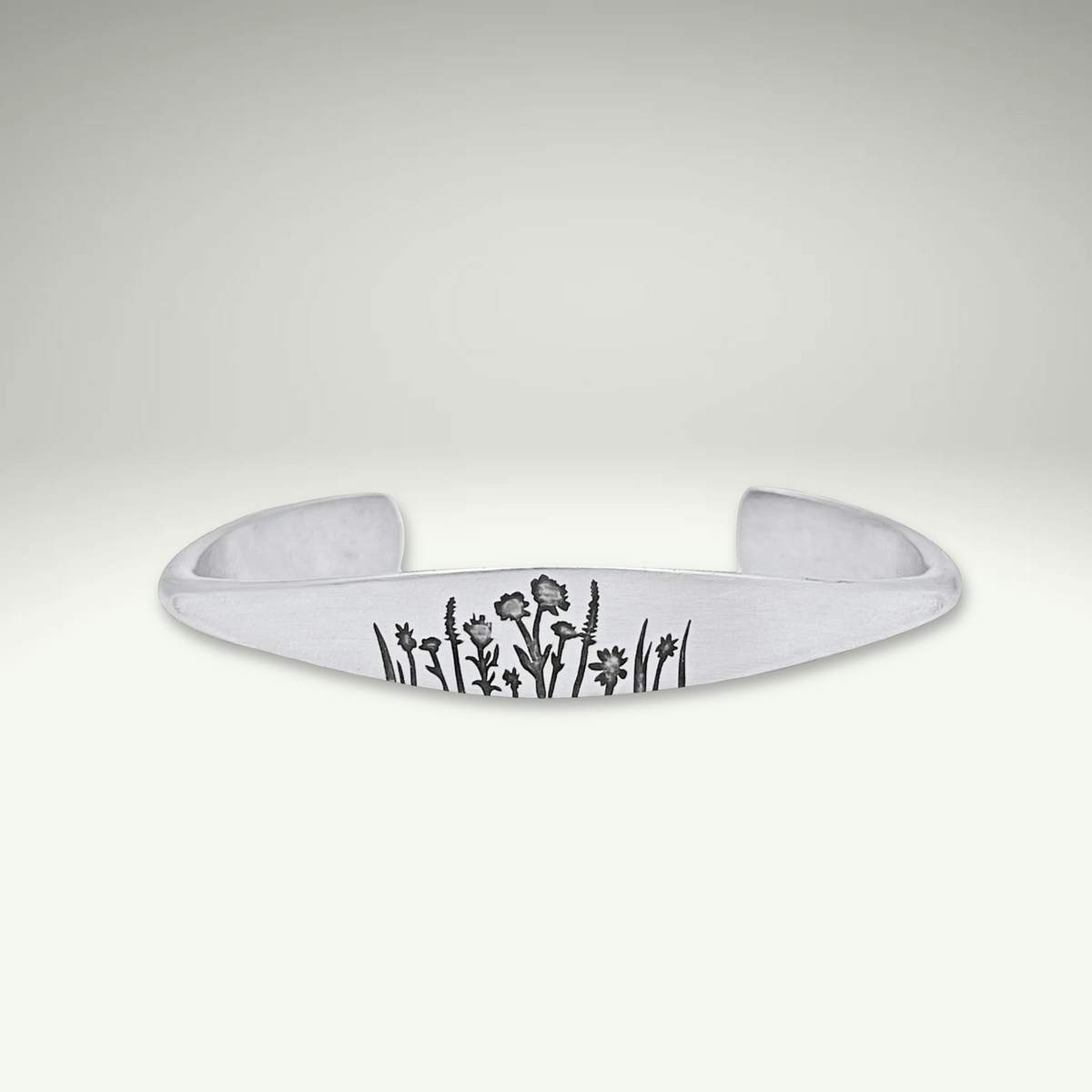 a white bracelet with black writing on it