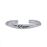 a silver bracelet with a fish on it