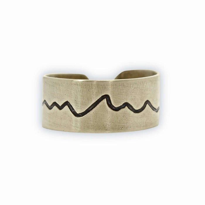 Simple Mountain Adjustable Ring with etched mountain design in raw brass, perfect for nature lovers.