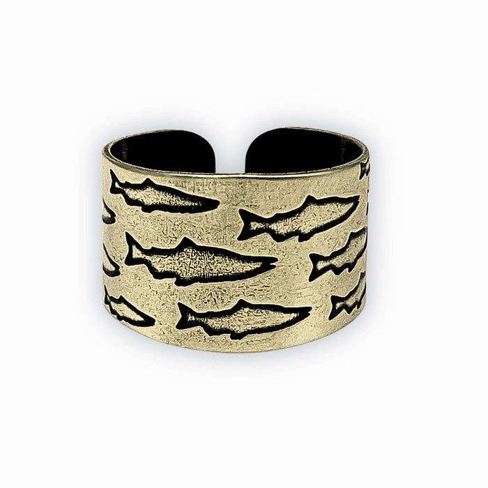 Salmon Run Adjustable Ring featuring salmon designs etched on a raw brass handcrafted band.