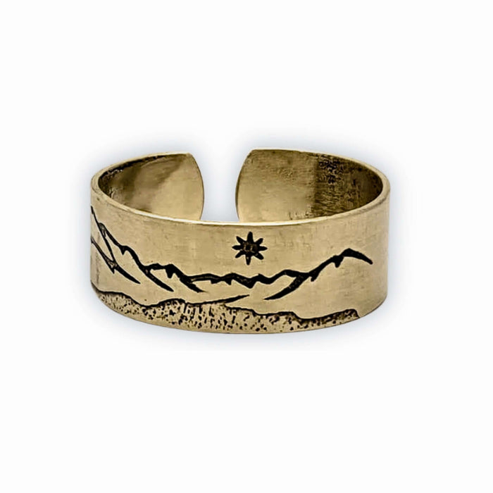 St. Mary Lake Adjustable Ring in Antique Brass featuring mountain and sun design, capturing the essence of Glacier National Park.