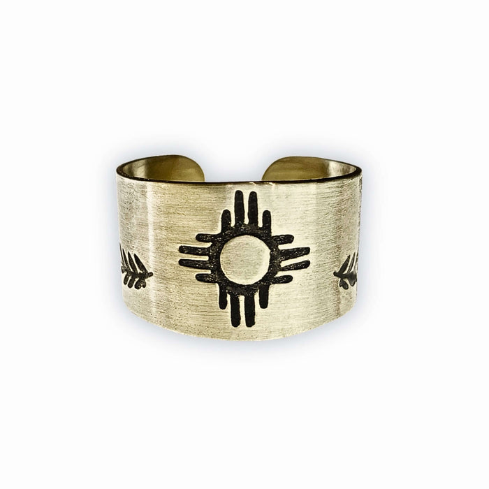 Sol Adjustable Ring featuring Zia sun design in raw brass, perfect for sun-worshippers and summer lovers.