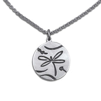 Handmade dragonfly pendant in matte silver on an adjustable rolo chain, showcasing intricate design and craftsmanship.