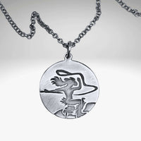 Silver pendant with a cowgirl on a horse with a lasso in matte silver on simple chain