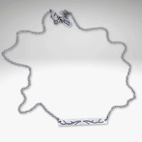 Antler Bar Necklace in matte silver with a delicate cable chain, showcasing nature-inspired design.