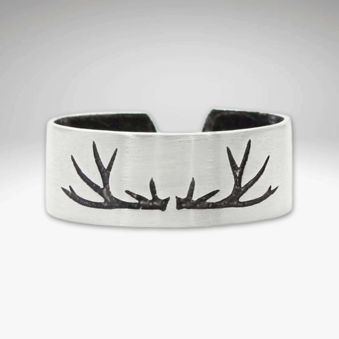 Antlers Adjustable Ring showcasing a handcrafted antler design in matte silver finish, ideal for nature enthusiasts.