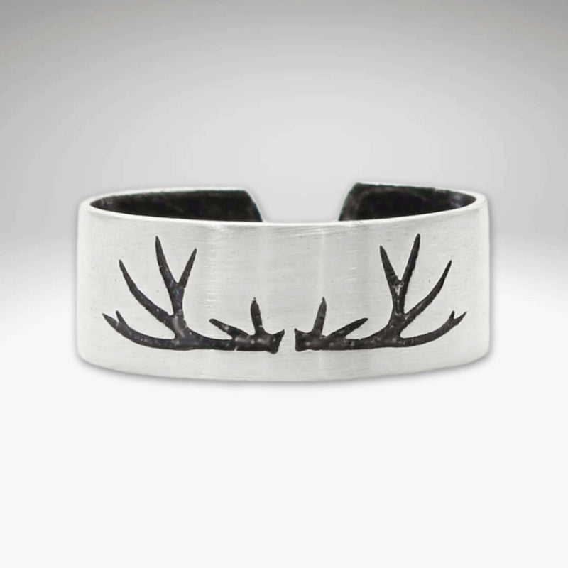 Antlers Adjustable Ring showcasing a handcrafted antler design in matte silver finish, ideal for nature enthusiasts.