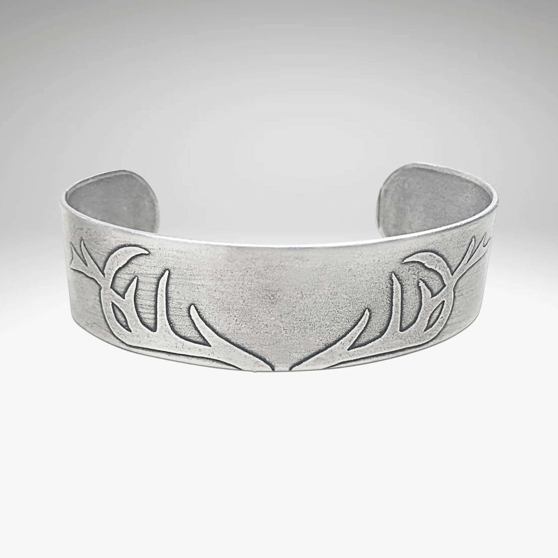 Antlers Cuff Bracelet in Matte Silver finish, showcasing unique etching of antlers, perfect gift for wildlife lovers.