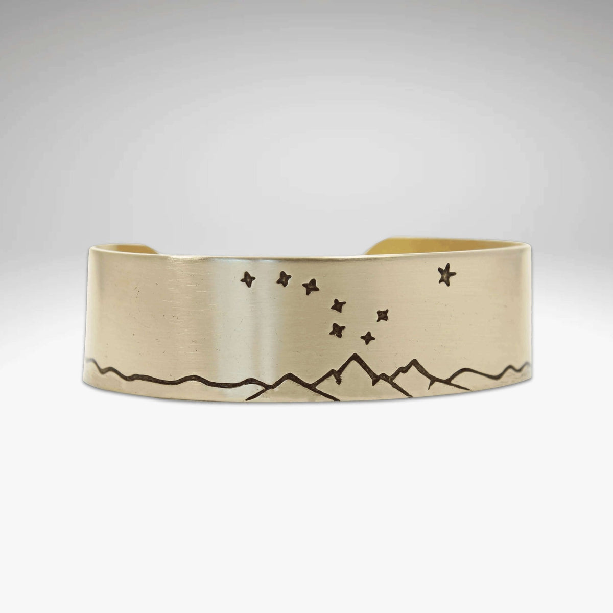 Big Dipper Cuff Bracelet showcasing mountain and star etching, representing the beauty of the night sky.
