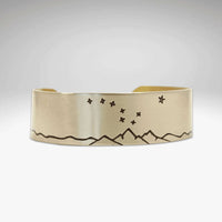 Big Dipper Cuff Bracelet showcasing mountain and star etching, representing the beauty of the night sky.