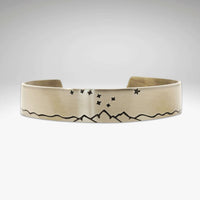 Big Dipper Cuff Bracelet featuring a mountain and starlight design, perfect for nature lovers.