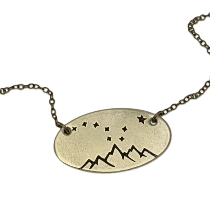 Big Dipper Necklace featuring mountains and stars on a delicate chain, a reminder of the night sky.