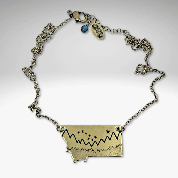 Big Dipper Over Montana Necklace showcasing a mountain outline and stars, perfect for Montana pride.