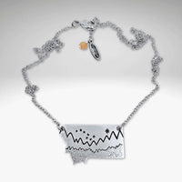 Big Dipper Over Montana Necklace featuring Montana silhouette and unique mountain and star etching.