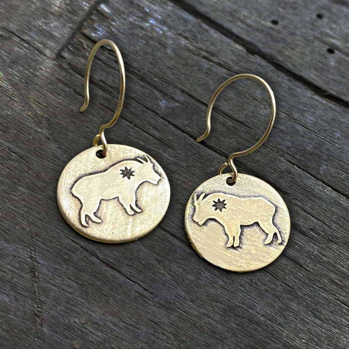 Billy Goat Earrings featuring a tiny star inside the goat with simple rounded earwires for everyday wear.