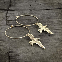 Birds on a Wire Hoop Earrings featuring gently hammered birds in antique brass finish.