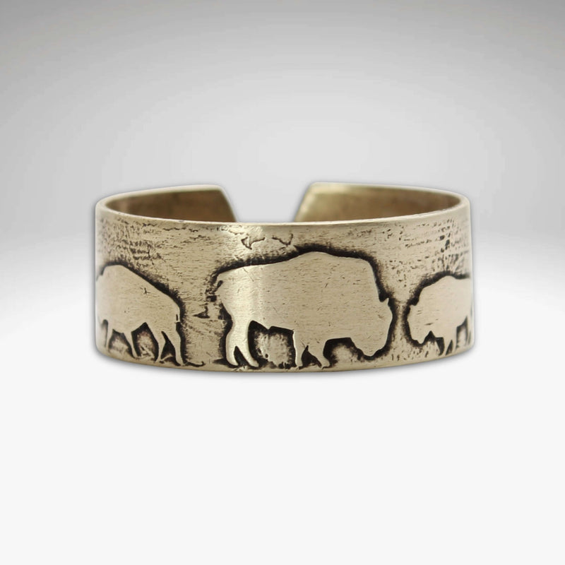 Bison Circles Adjustable Ring featuring bison motifs in antique brass finish.