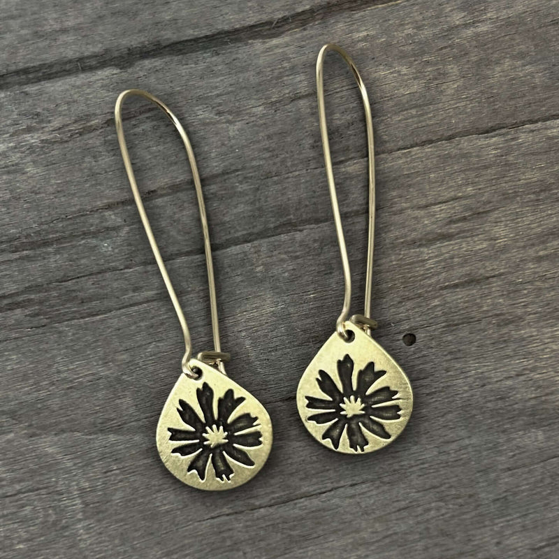 Bitterroot Drop Earrings featuring unique kidney earwire in Antique Brass finish, teardrop design with floral details.