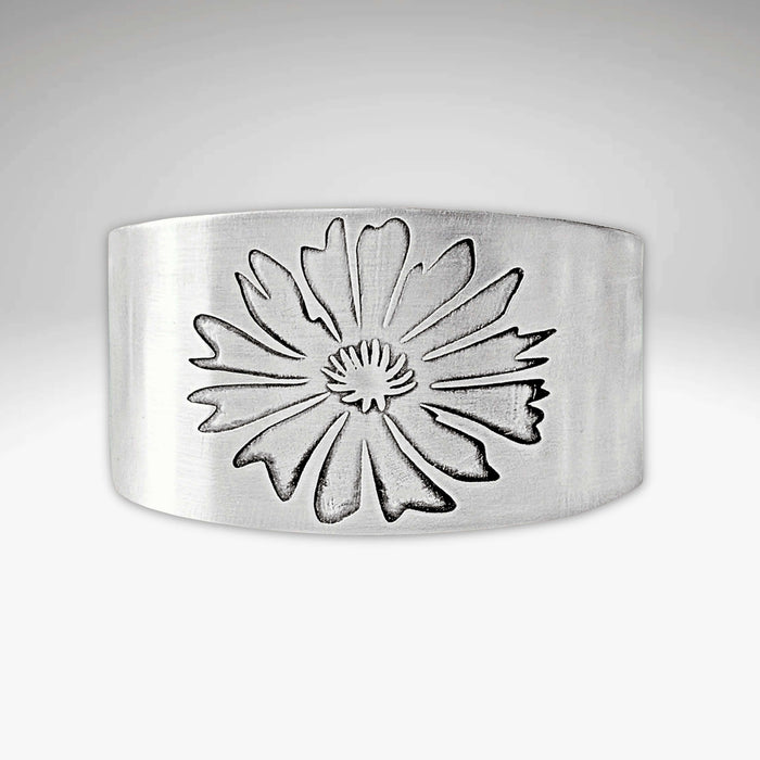 Bitterroot Flower Cuff Bracelet in matte silver with intricate floral design, adjustable, handmade in Montana.