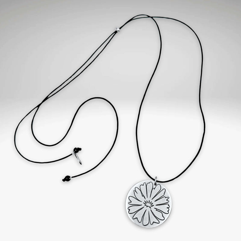 Bitterroot Necklace featuring a big bitterroot flower pendant on an adjustable cord.