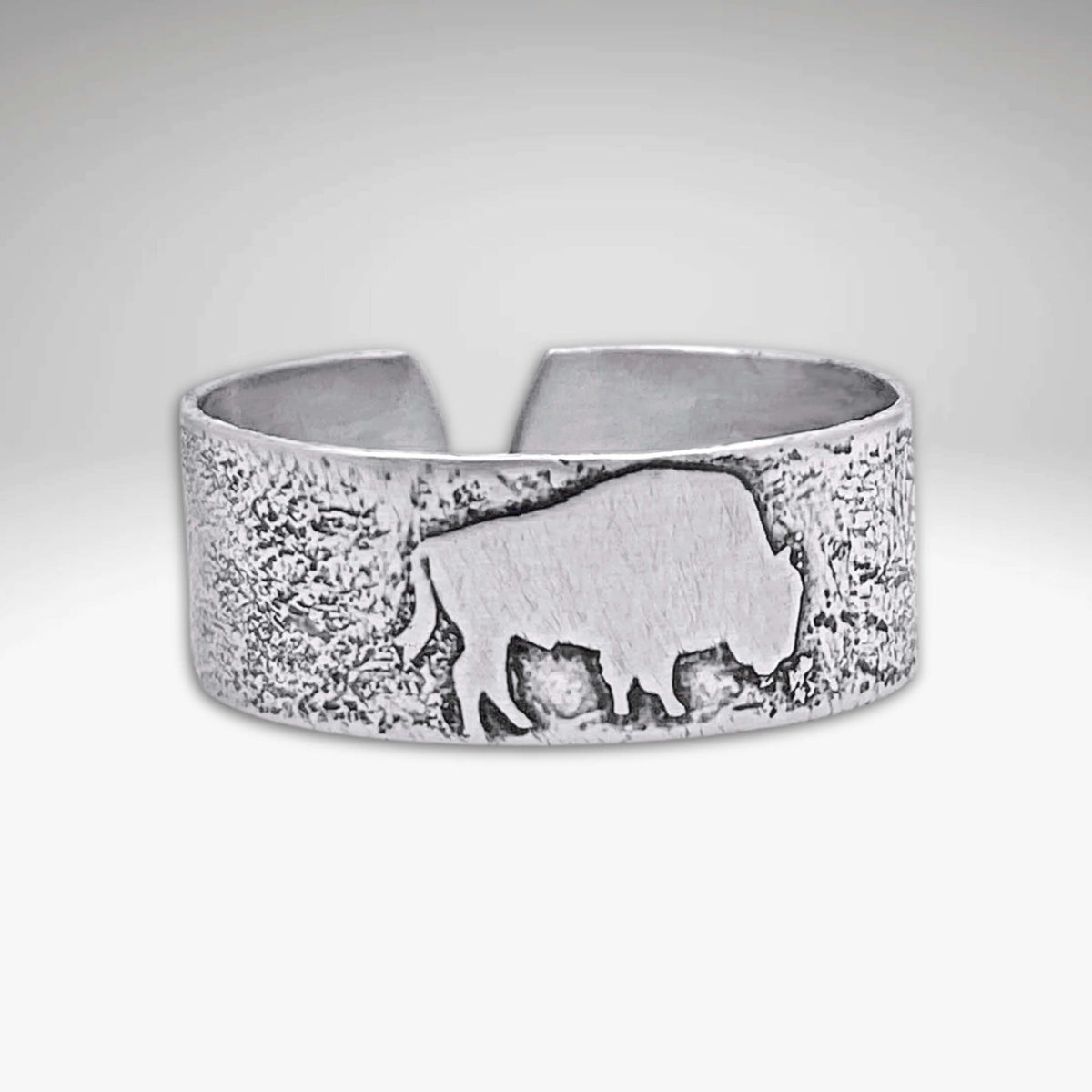 Buff Adjustable Ring with elegant bison design in matte silver finish, perfect for nature lovers.