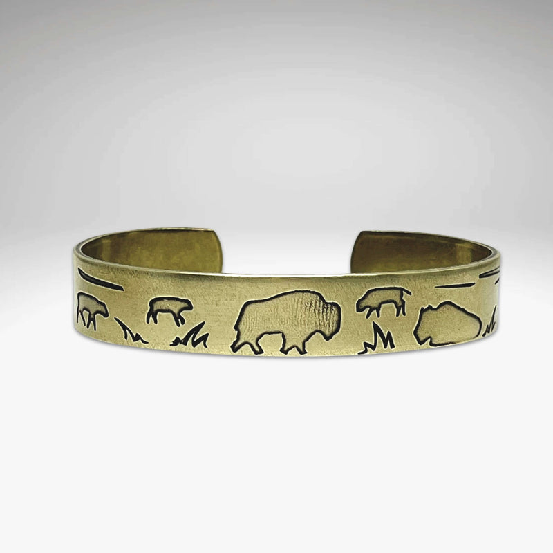 Buff and Babes Cuff Bracelet featuring intricate bison designs, symbolizing new beginnings and spring prairie exploration.