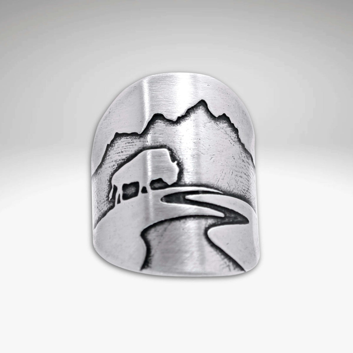 Buff in the Tetons Adjustable Ring featuring a beautiful engraving of mountains and a buffalo.