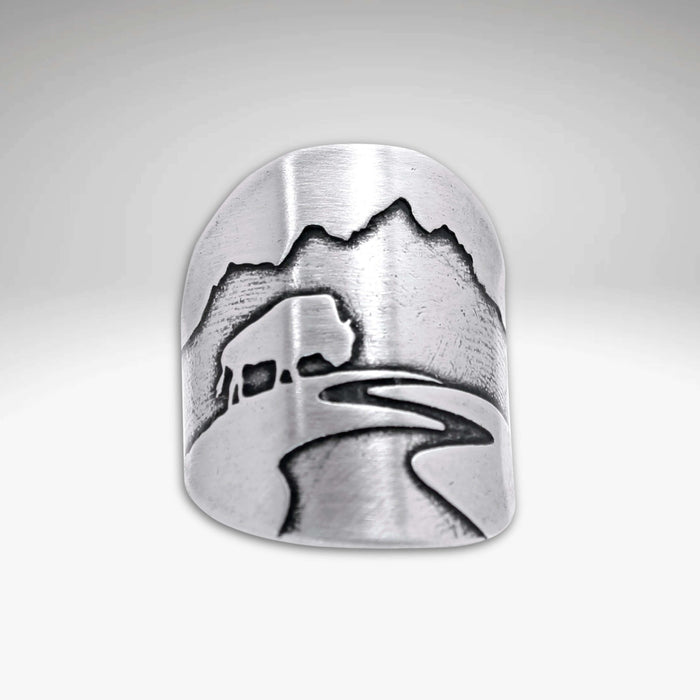 Buff in the Tetons Adjustable Ring featuring a beautiful engraving of mountains and a buffalo.