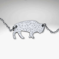 Buffalo Necklace featuring a hand-finished matte silver buffalo pendant on an 18" cable chain.