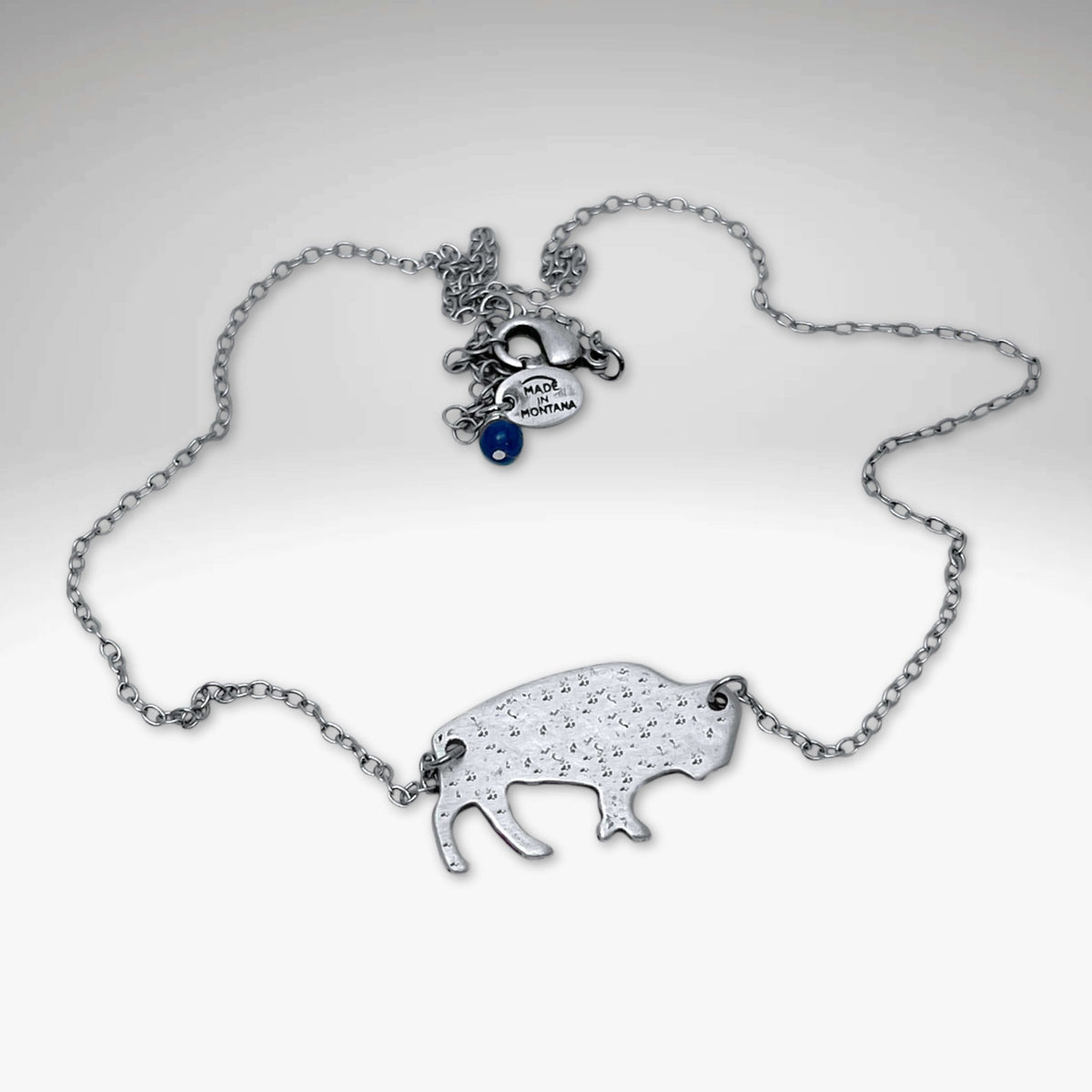 Buffalo Necklace featuring a rustic silver bison pendant on a delicate chain, perfect for wild style lovers.