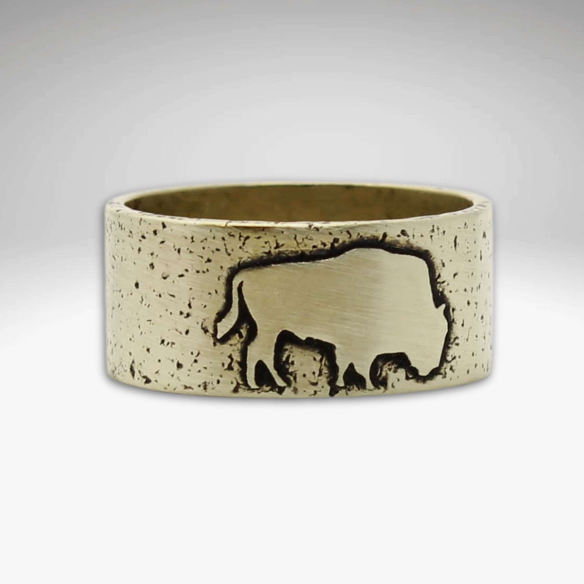 Buffalo Ring featuring a textured design and bison silhouette in solid brass finish.