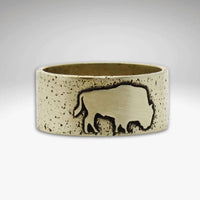 Buffalo Ring featuring a textured design and bison silhouette in solid brass finish.