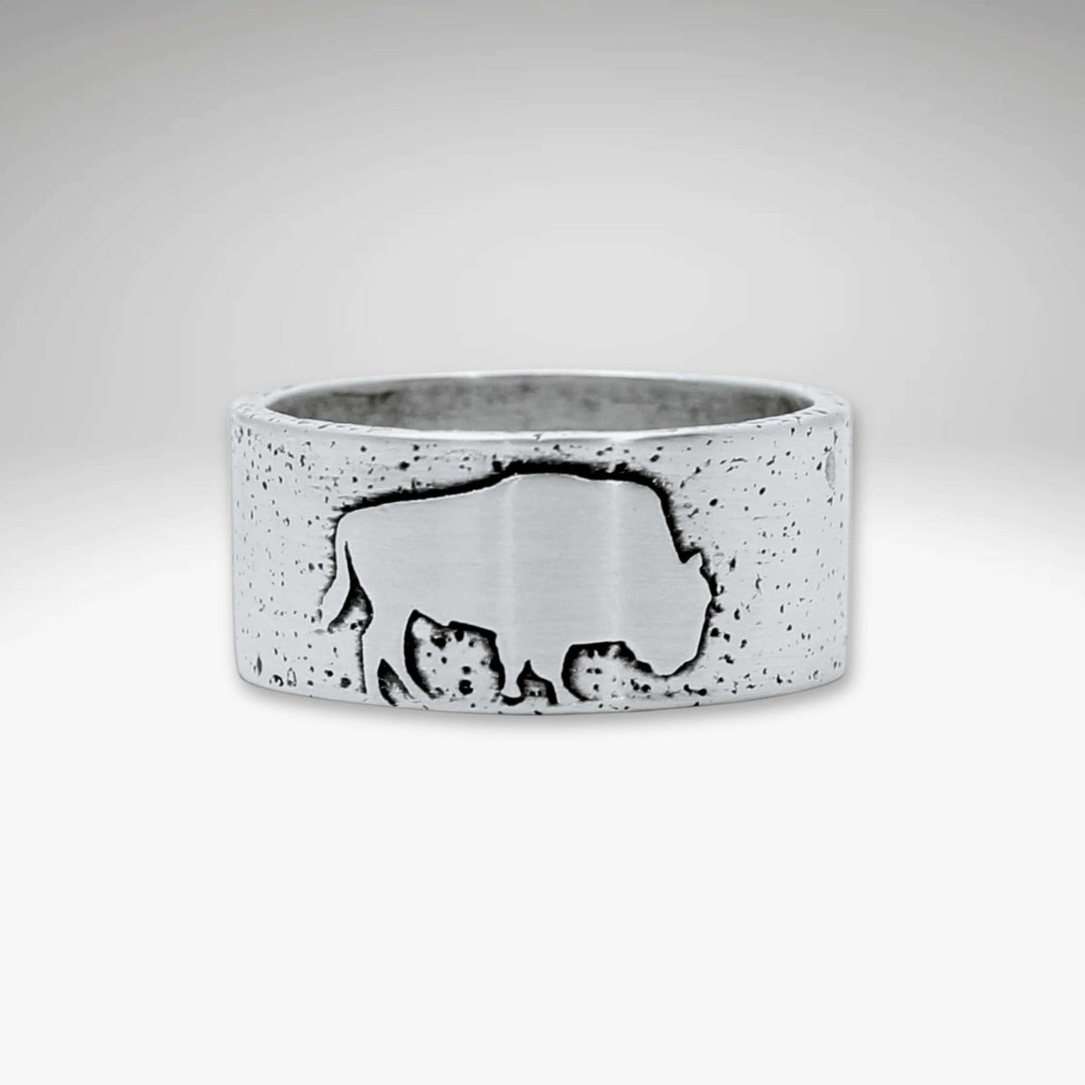 Buffalo Ring featuring a textured background and bison design in solid brass finish.
