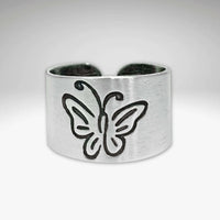 Butterfly Adjustable Ring featuring a whimsical butterfly design on a matte silver adjustable band.