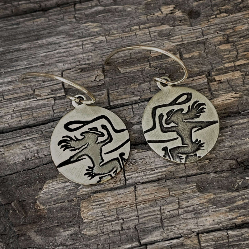 Cowgirl Earrings featuring etched cowgirl design on raw brass with simple earwires in matte silver or antique brass.