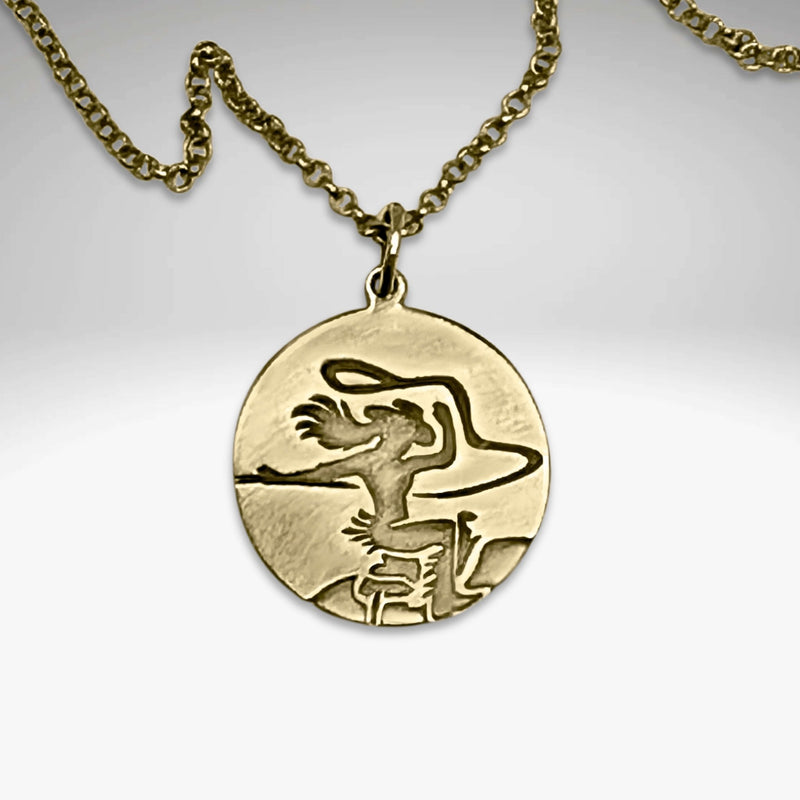 Cowgirl Necklace pendant featuring a cowgirl riding a horse with her hair flying in the wind.