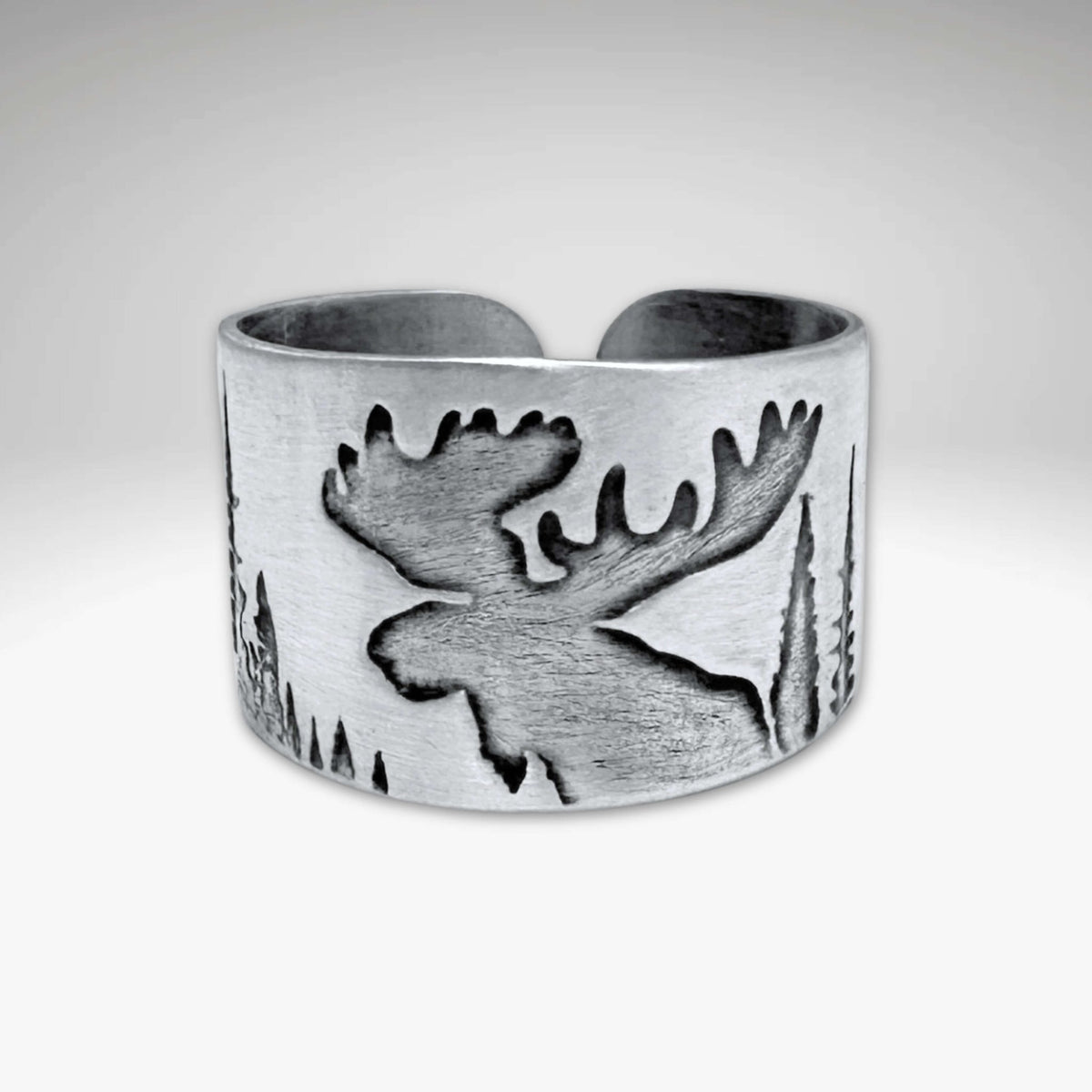Creek Moose Adjustable Ring with intricate moose engraving and creek backdrop in matte silver finish.