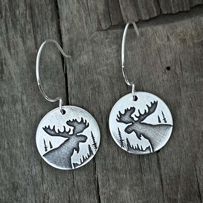 Creek Moose Earrings showcasing detailed moose design with sterling silver ear wires, perfect for wilderness lovers.