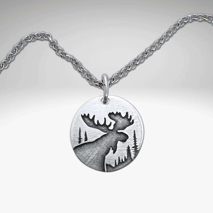 Creek Moose Necklace pendant on rolo chain, handmade in Montana, available in matte silver finish.