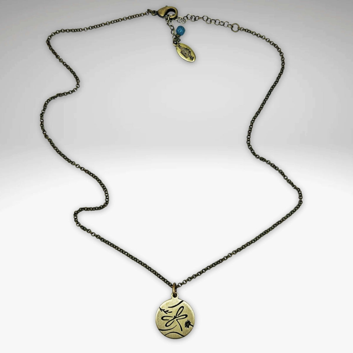 Dragonfly Necklace in antique brass finish on an adjustable rolo chain.