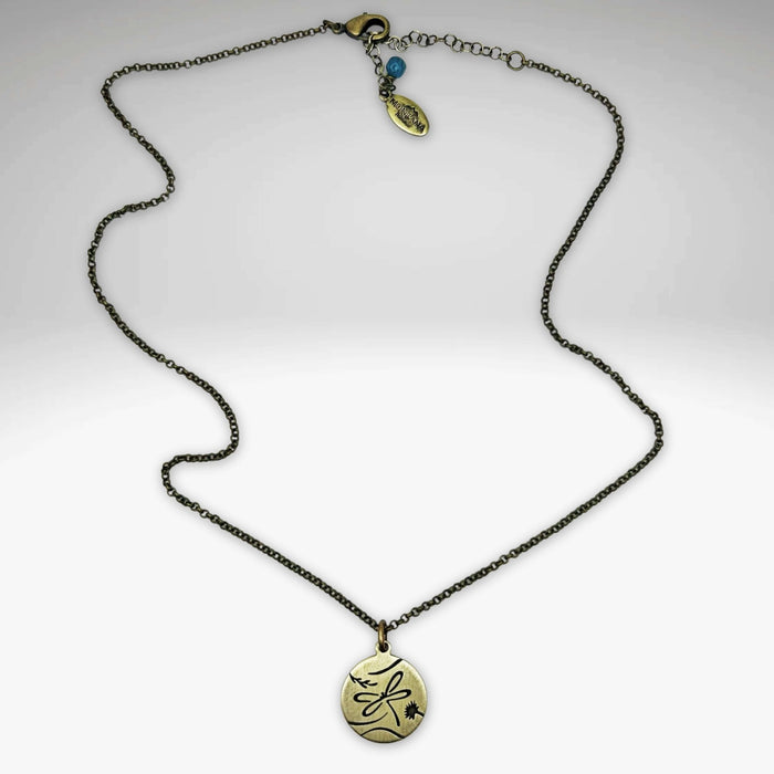 Dragonfly Necklace in antique brass finish on an adjustable rolo chain.