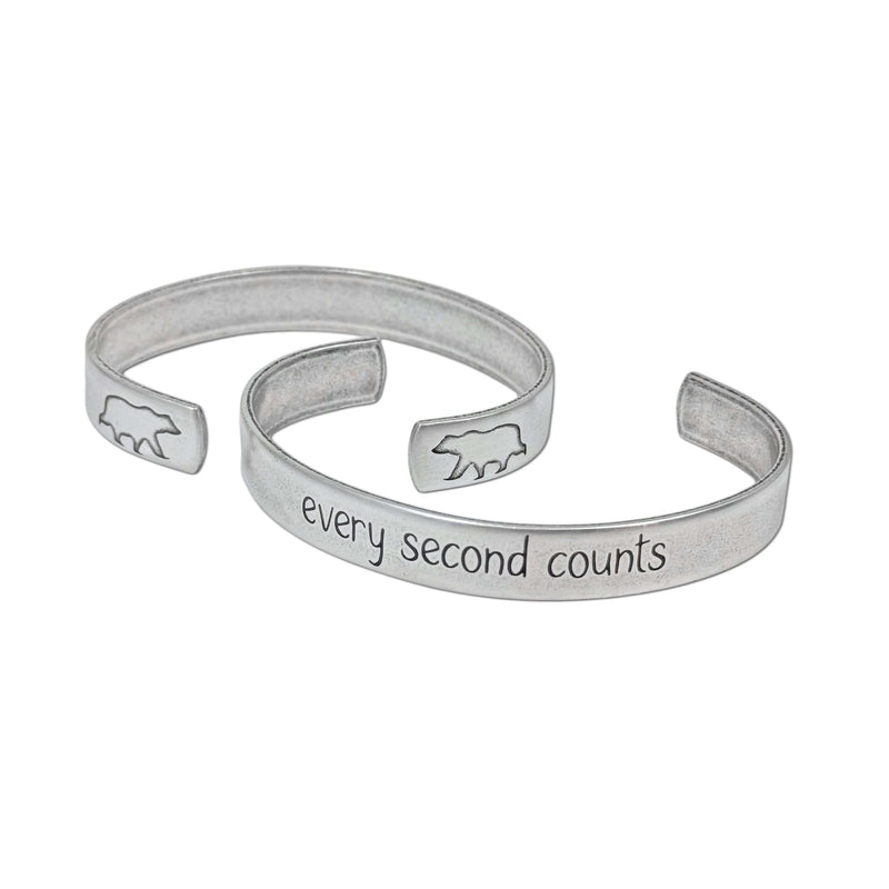 Every second counts - Bear Cuff Bracelet in raw brass, featuring etched phrase and bear designs.