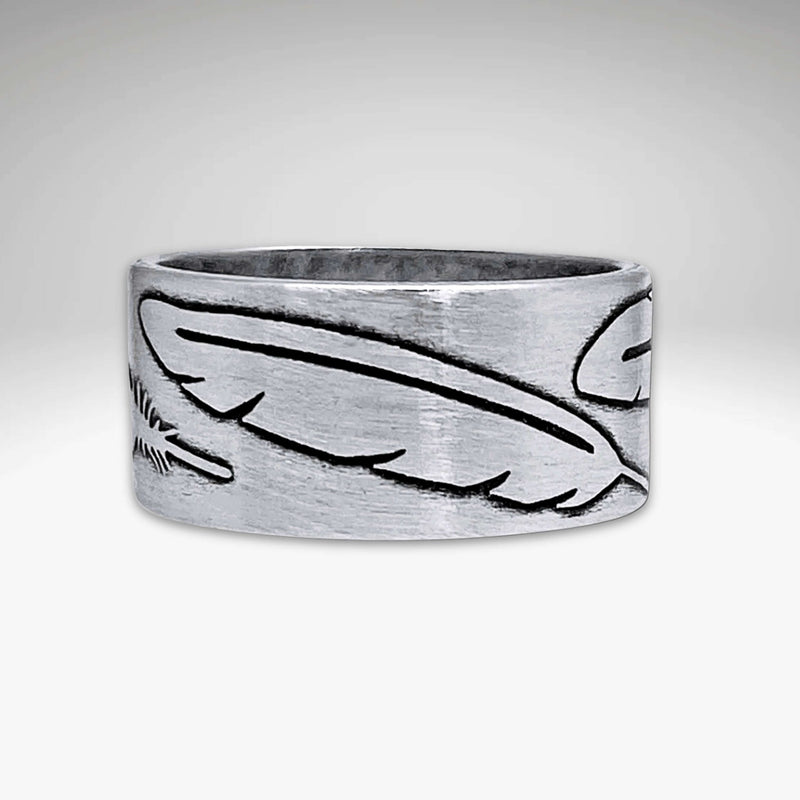 Feather Ring in Matte Silver finish featuring distinct feather engravings on a polished band.
